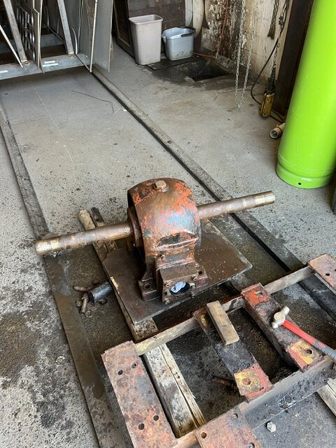Anchor windlass stripped to its central housing and shaft