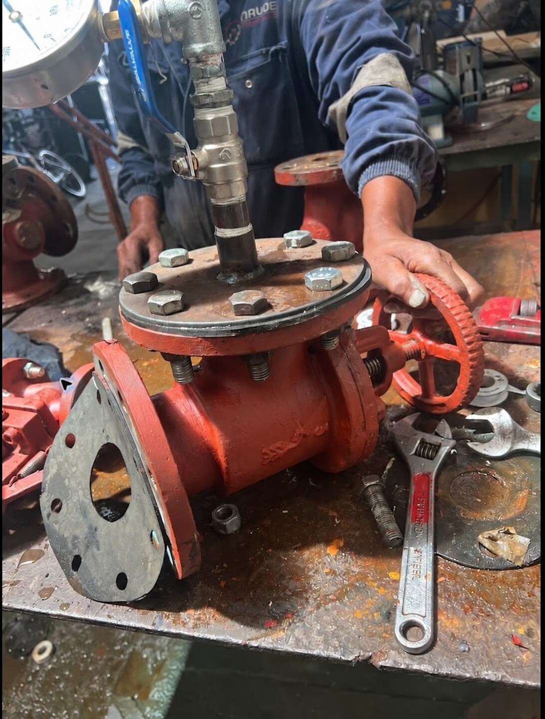 Marine valve being pressure tested after overhaul